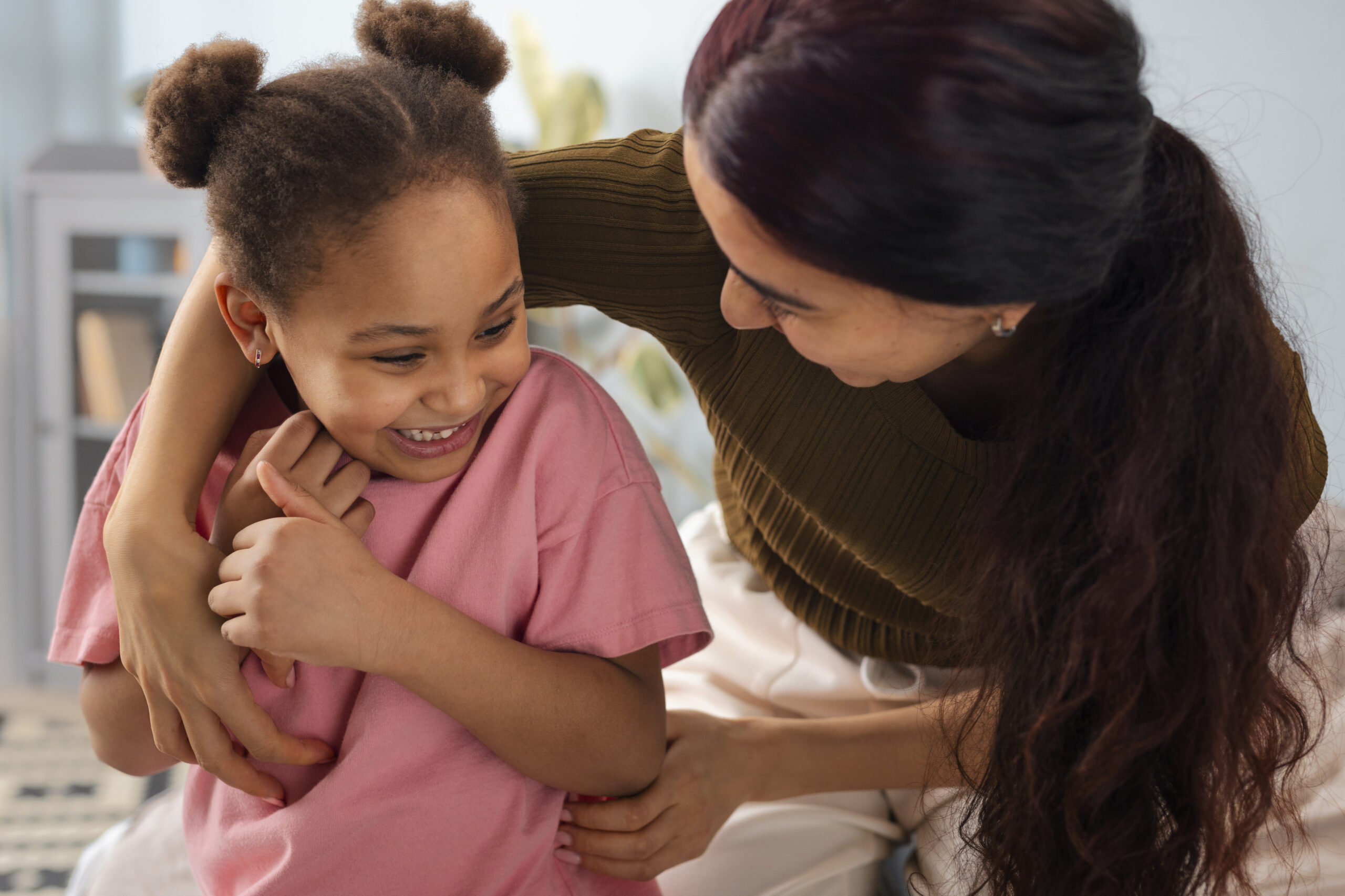 medium-shot-mother-girl-home